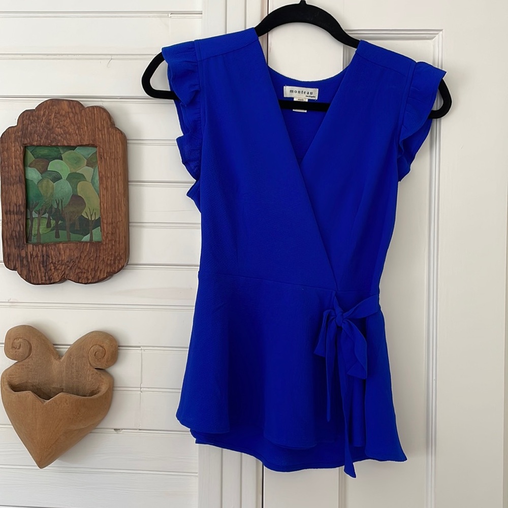 Monteau blouse in a Size small. Bright blue wrap tie.